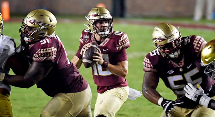 FSU's McKenzie Milton takes a snap vs Notre Dame